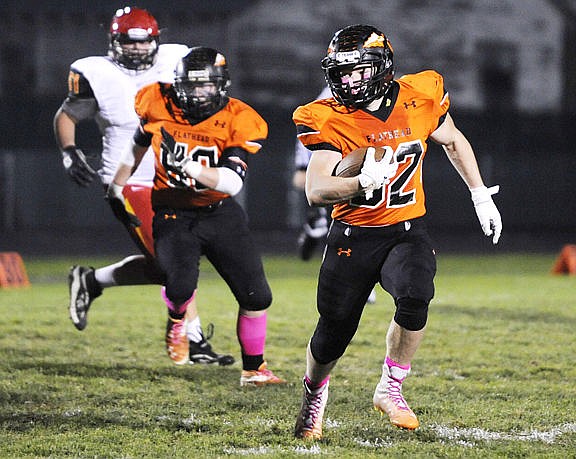 &lt;p&gt;Flathead running back Josh McCracken speeds around the corner for a long gain during the second quarter. (Aaric Bryan/Daily Inter Lake)&lt;/p&gt;