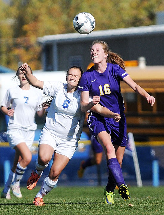 <p>Columbia Falls' Katie Price battles with Laurel's Carlie McGrath for a ball during the 3-1 playoff loss. (Aaric Bryan/Daily Inter Lake)</p>