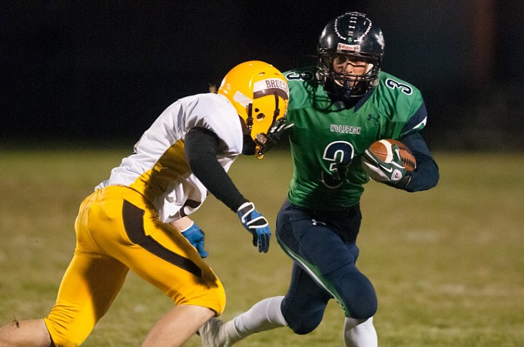 &lt;p&gt;Patrick Cote/Daily Inter Lake Glacier junior wide receiver Kyle Griffith (3) stiff arms a defender Thursday night during Glacier's matchup against Helena Capital at Legends Stadium Thursday, Oct. 18, 2012 in Kalispell, Montana.&lt;/p&gt;