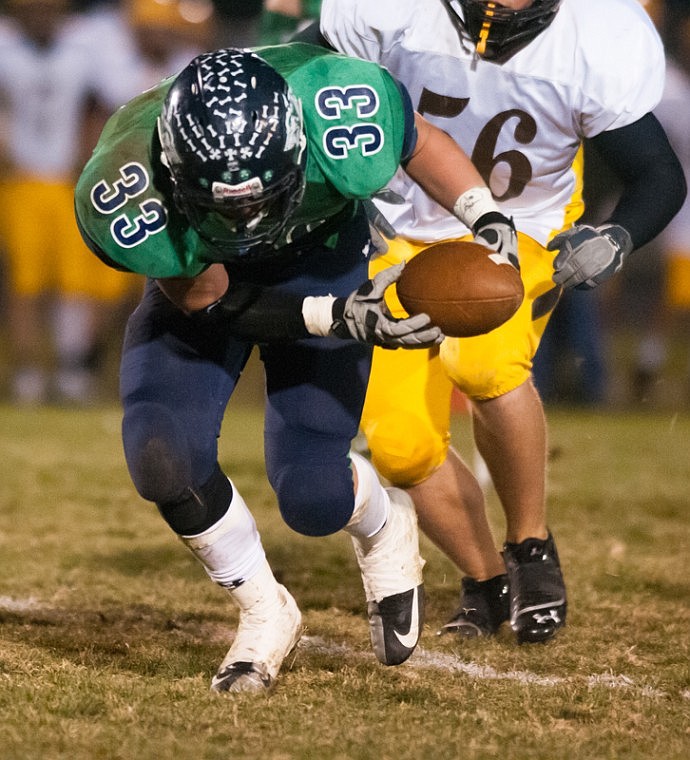 &lt;p&gt;Patrick Cote/Daily Inter Lake Glacier senior defensive lineman Brendan Windauer (33) scoops up a fumble Thursday night during Glacier's matchup against Helena Capital at Legends Stadium Thursday, Oct. 18, 2012 in Kalispell, Montana.&lt;/p&gt;