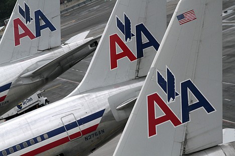 &lt;p&gt;FILE - In this Wednesday, Aug. 1 2012 file photo, American Airlines airplanes are parked at their gates at JFK International airport in New York. American Airlines said Wednesday, Oct. 17, 2012 said that it will post job openings for 1,500 flight attendants next month. It will start hiring in December and put the new staff in training beginning in January. (AP Photo/Mary Altaffer, File)&lt;/p&gt;