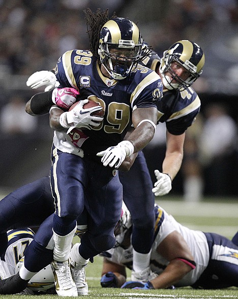 &lt;p&gt;St. Louis running back Steven Jackson (39) runs through the San Diego defense during the second quarter of the Rams' 20-17 win Sunday in St. Louis. Jackson finished with 109 yards and a touchdown for the Rams, who won their third straight at home for the first time since 2004.&lt;/p&gt;