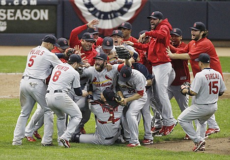 &lt;p&gt;The St. Louis Cardinals celebrate after Game 6 of the National League championship series after beating the Brewers 12-6 Sunday in Milwaukee.&lt;/p&gt;