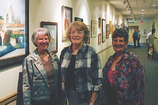 Joy Nelson, Arlene Littlefield, and Virgina Fortner, the organizers of the Art on the Walls event, at the Clark Fork Valley Hospital in Plains.