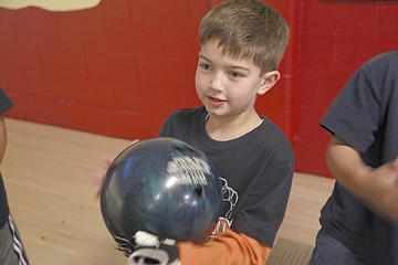 &lt;p&gt;After a careful search for a lucky ball, second-grader James Kenelty is ready to roll.&#160;&lt;/p&gt;