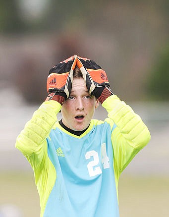 <p>Whitefish goalkeeper Marty Anderson breathes a sigh of relief on the sidelines after the Bulldogs scored two goals in the final two minutes to beat Hamilton 4-3 on Saturday. (Aaric Bryan/Daily Inter Lake)</p>