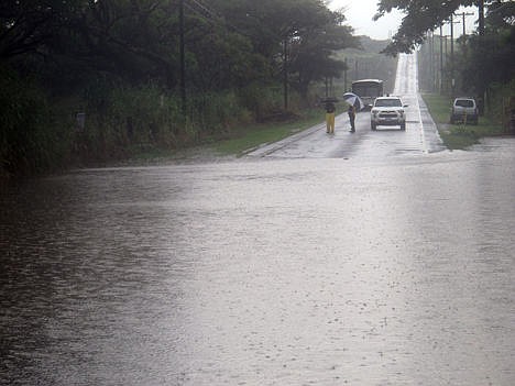 &lt;p&gt;A county bus is stranded on Highway 11 in Naalehu, Hawaii where heavy rains from Hurricane Ana flooded the road on Saturday.&#160;&lt;/p&gt;