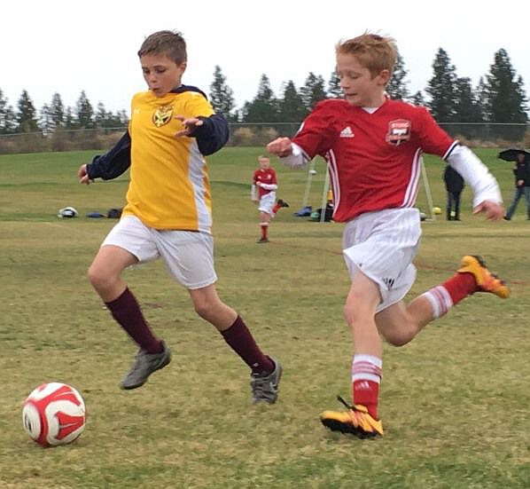 &lt;p&gt;Courtesy photo&lt;/p&gt;&lt;p&gt;Caden Thompson (red jersey) of the Coeur d'Alene Sting Timbers 05 boys red (Thompson) boys soccer team battles another player for the ball in a recent game.&lt;/p&gt;