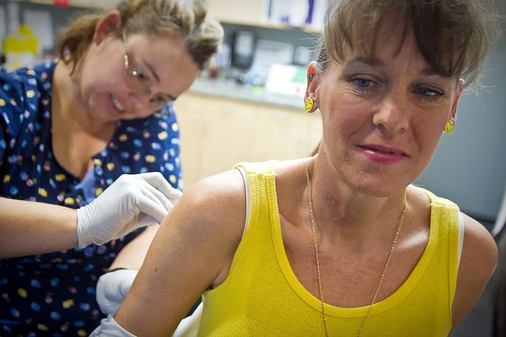 &lt;p&gt;Linda Paullas receives her last injection from Michelle Huskinson, a nurse at Asthma &amp; Allergy of North Idaho, to desensitize herself to allergic reactions from bee stings. Paullas underwent monthly treatments for five years following a near fatal allergic reaction to a bee sting.&lt;/p&gt;