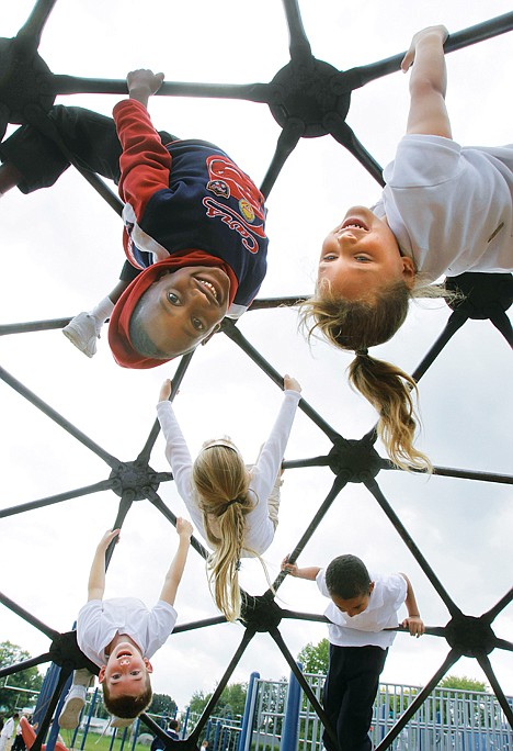 &lt;p&gt;In this Sept. 20, 2011 photo, students enjoy the playground during part of their physical education class at Northeast Elementary Magnet, in Danville, Ill. The curriculum at the public school is focused on health and wellness, and families have to sign a contract agreeing to abide by that. School lunches are low-fat or no-fat, with fresh fruit or veggies every day, and no dessert. (AP Photo/Seth Perlman)&lt;/p&gt;