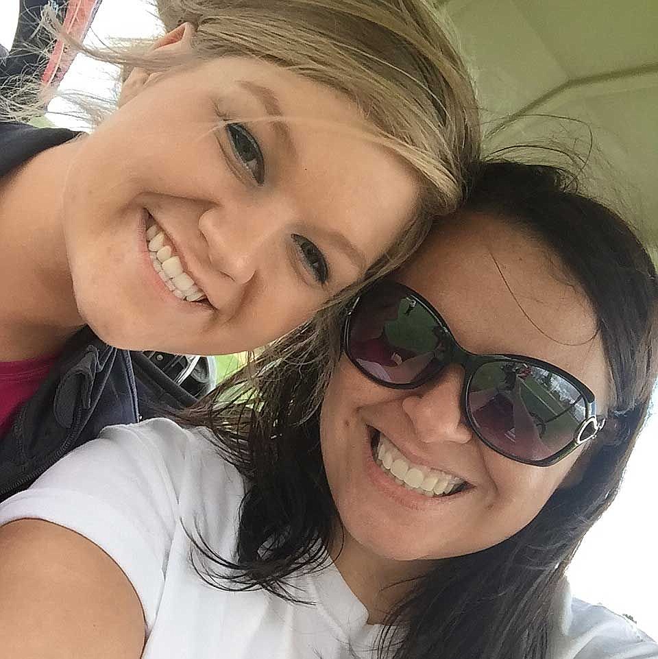 Hannah Bisnett (left) along with Sun Tribune employee Jill Baker, take a quick break for a selfie during golf on Saturday.
