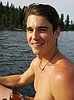 Lake City grad Tanner survives shark attack