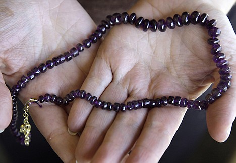 &lt;p&gt;An amethyst necklace is displayed in this photograph in New York, Tuesday, Oct. 18, 2011. Online jeweler Stauer is offering a $249 amethyst necklace for free _ provided customers pay the $24.95 it costs to ship it. Stauer is losing money by giving the necklaces away, but it hopes it will reel in new customers and spur them to buy other jewelry. (AP Photo)&lt;/p&gt;