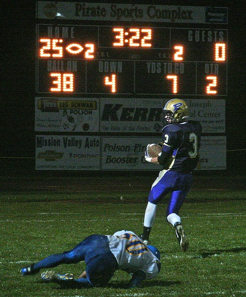 &lt;p&gt;Polson's Ian Laimbeer looks back while scoring a touchdown
against Libby last Friday.&lt;/p&gt;