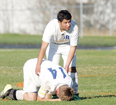 &lt;p&gt;Senior midfielder Zander Petersen, below, expresses his grief after losing 6-5 to Valley Christian in a shoot-out Oct. 17. Giovanni Cano, top.&lt;/p&gt;