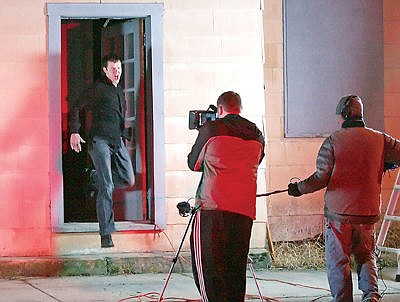 &lt;p&gt;Actor Mighet Matanane exits Hotel Libby into a &quot;hail of gun fire&quot; Saturday as Robert Newman films this scene from &quot;Doom Service.&quot; (March 9, 2013)&lt;/p&gt;