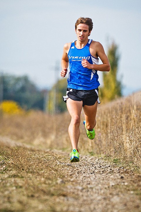 &lt;p&gt;SHAWN GUST/Press Cody Curtis, a Coeur d'Alene High School senior, leads the boys race in Post Falls.&lt;/p&gt;