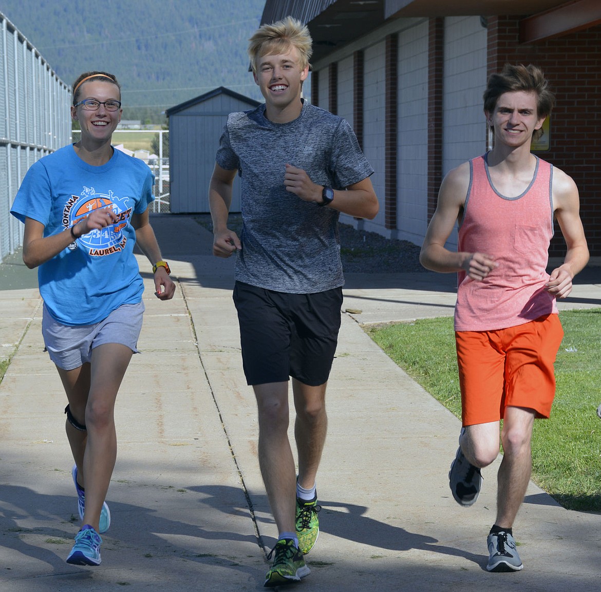 &lt;p&gt;RONAN TOP runners &lt;strong&gt;Ashley McCready&lt;/strong&gt;, &lt;strong&gt;Jackson Duffey,&lt;/strong&gt; and &lt;strong&gt;Daniel Koehler&lt;/strong&gt; prepare for the Class B State Cross Country meet Saturday in Kallispell. The Class B Boys meet will start at 12:10 p.m. and the Class B girls meet will begin at 11 a.m. at at Rebecca Farms in Kalispell. (Jason Blasco/Lake County Leader) &#160;&lt;/p&gt;