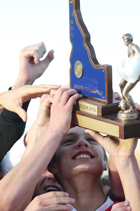 &lt;p&gt;Sandpoint junior Jeremiah Gagnon and teammates lift the 2012 4A boys state soccer championship trophy above their heads Saturday following their 3-2 win over Skyview at the Idaho Falls Soccer Complex.&lt;/p&gt;