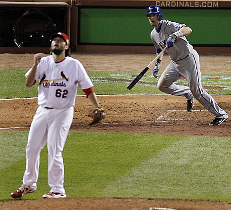 &lt;p&gt;Texas Rangers' Michael Young watches his RBI sacrifice fly ball hit off St. Louis Cardinals' Lance Lynn (62) during the ninth inning of Game 2 of baseball's World Series Thursday, Oct. 20, 2011, in St. Louis. (AP Photo/Jeff Roberson)&lt;/p&gt;