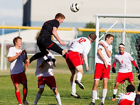 &lt;p&gt;Timmy Mueller of Post Falls aims a header toward the goal over a handful of Boise High defenders in the first half.&lt;/p&gt;