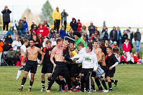 &lt;p&gt;The Post Falls High School boys soccer team celebrates after a 3-0 victory over Boise High in the state 5A boys soccer championship Saturday in Coeur d'Alene.&lt;/p&gt;