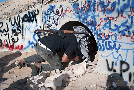 &lt;p&gt;Revolutionary Libyan fighters inspect a storm drain where they claim Moammar Gadhafi was found wounded in Sirte, Libya, Thursday, Oct. 20, 2011. Gadhafi was killed Thursday when revolutionary forces overwhelmed his hometown, Sirte, the last major bastion of resistance two months after the regime fell. (AP Photo/David Sperry)&lt;/p&gt;