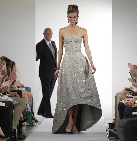 &lt;p&gt;Fashion designer Oscar de la Renta watches as the final model walks the runway during the presentation of his Spring 2013 collection at Fashion Week in New York, Sept. 11, 2012. Fashion designer Oscar de la Renta watches as the final model walks the runway during the presentation of his Spring 2013 collection at Fashion Week in New York, Sept. 11, 2012.&lt;/p&gt;