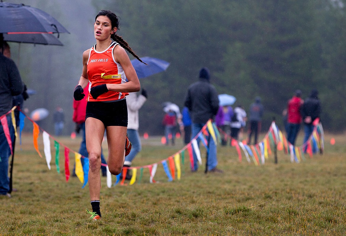 &lt;p&gt;JAKE PARRISH/Press Ida Mae Brooks of Post Falls makes her way down the finish chute at the 5A Region 1 cross country meet on Thursday at Farragut State Park. Finishing second, Brooks finished with a time of 20 minutes, 9.3 seconds.&lt;/p&gt;