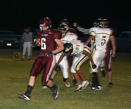 Alberton's Todd Mrystol comes to a halt after a call is made at Alberton's game versus Heart Butte.