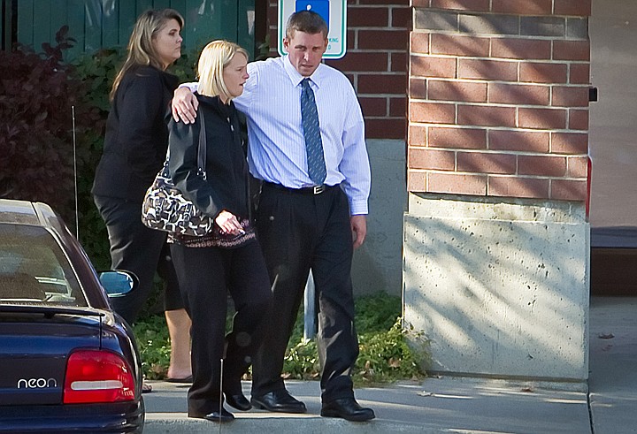 &lt;p&gt;Robert &quot;Bob&quot; Critchfield walks alongside his wife Angie Critchfield toward their attorney's office following his trial Thursday where he was convicted of child molestation for fondling two young girls.&lt;/p&gt;