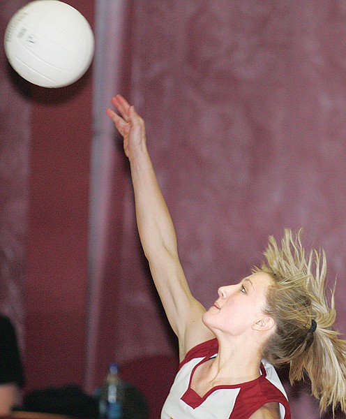 Troy&#146;s Brittany Bradbury goes in for a kill against Bigfork.