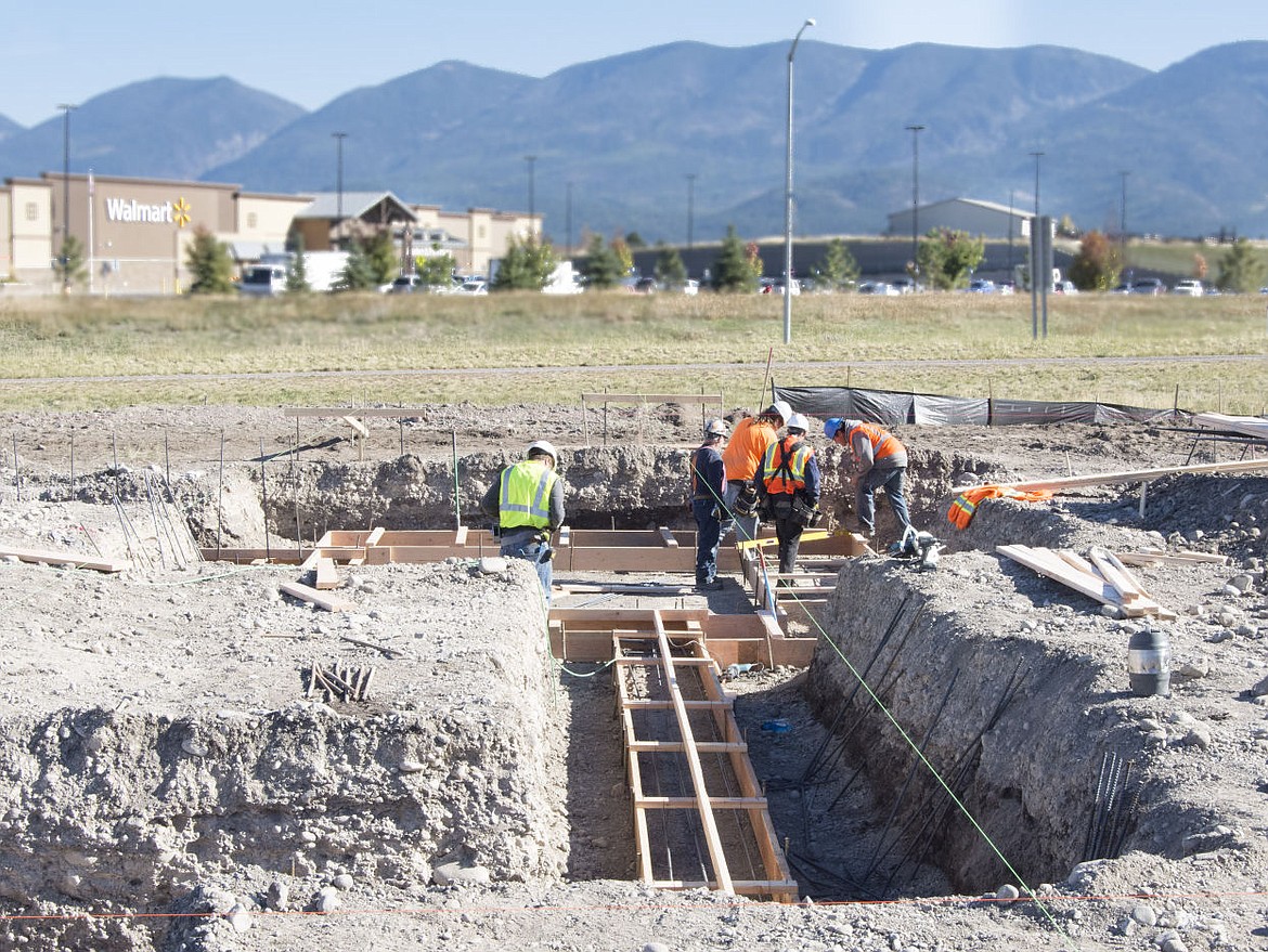 &lt;p&gt;Construction crews work at the site of the new St. Luke's clinic in Polson.&lt;/p&gt;