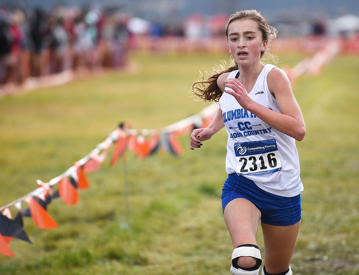 &lt;p&gt;Columba Falls freshman Kimberly Peacock powers to the finish line during the Montana Cross Country Championship at Rebecca Farm. Peacock finished in second place. (Aaric Bryan/Daily Inter Lake)&lt;/p&gt;