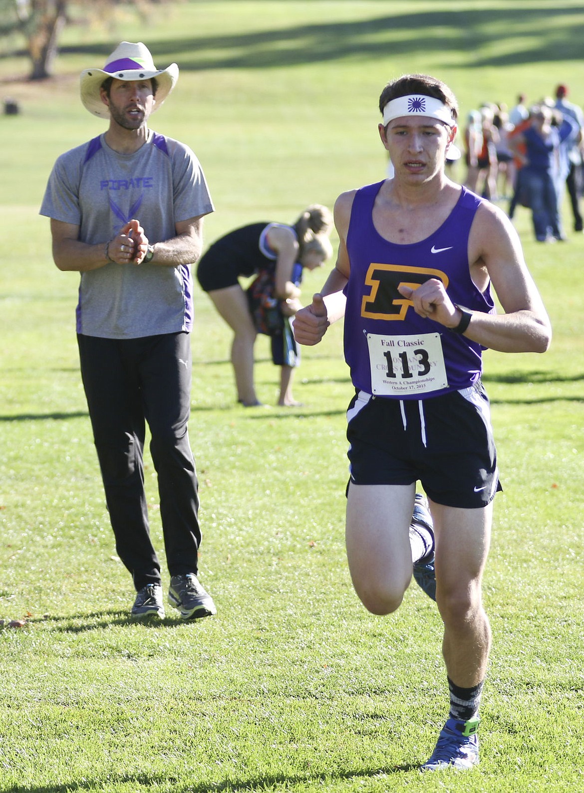 &lt;p&gt;Polson's coach Matt Seeley cheers on Wyatt Benson during the Western A Fall Classic in Polson on Saturday.&lt;/p&gt;