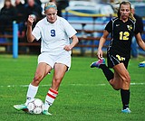 Strouse leads Kats to 5-0 playoff win