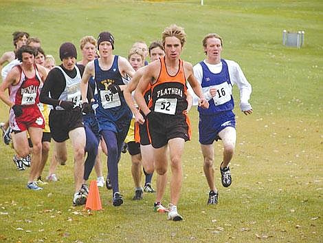 Flathead senior Seth Grossman leads the way during the early part of Saturday&#146;s Class AA state cross country meet at Bill Roberts Golf Course in Helena. Grossman finished fifth individually, helping Flathead to a second-place showing in the team standings. FHS had won the last two state AA titles. Bozeman captured the 2006 crown. David Lesnick/Daily Inter Lake