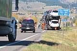Cargo hauler slips off roadway