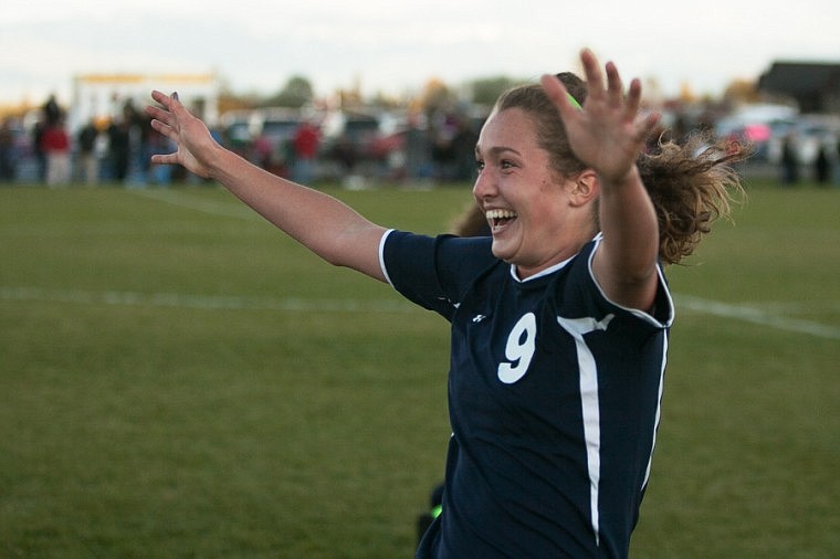&lt;p&gt;Patrick Cote/Daily Inter Lake Wolfpack senior Anna Deleray celebrates as she runs off the pitch Wednesday afternoon after Glacier's victory over Flathead in a play-in match at Kidsports Complex. Wednesday, Oct. 17, 2012 in Kalispell, Montana.&lt;/p&gt;