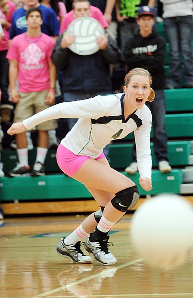 Glacier senior Rachel Cutler (4) yells encouragement to a teammate as she tries to save the ball during the game against Helena on Thursday in Kalispell.