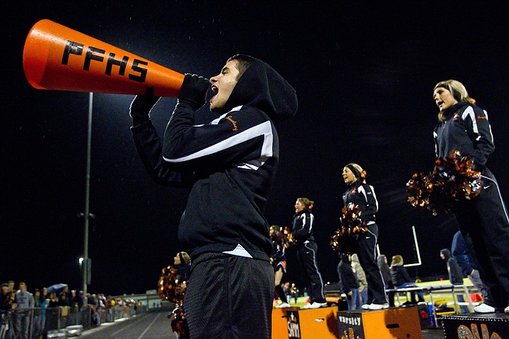 &lt;p&gt;Post Falls High cheerleader Tommy Elder tries to motivate the crowd with a megaphone Friday as their varsity football team hosted the Coeur d'Alene Vikings.&lt;/p&gt;