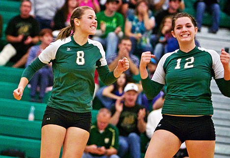 &lt;p&gt;St. Maries High's Lakin Anxo, left, and Marlee Masterson celebrate a point Saturday against Priest River in the 3A Region 1 tournament championship at Lakeland High.&lt;/p&gt;