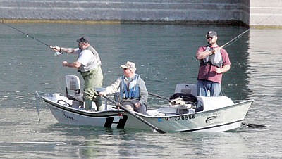 &lt;p&gt;Randall Vallee, left, Dave Blackburn and Joe Wright fishing below Libby Dam Saturday, Oct. 17.&lt;/p&gt;