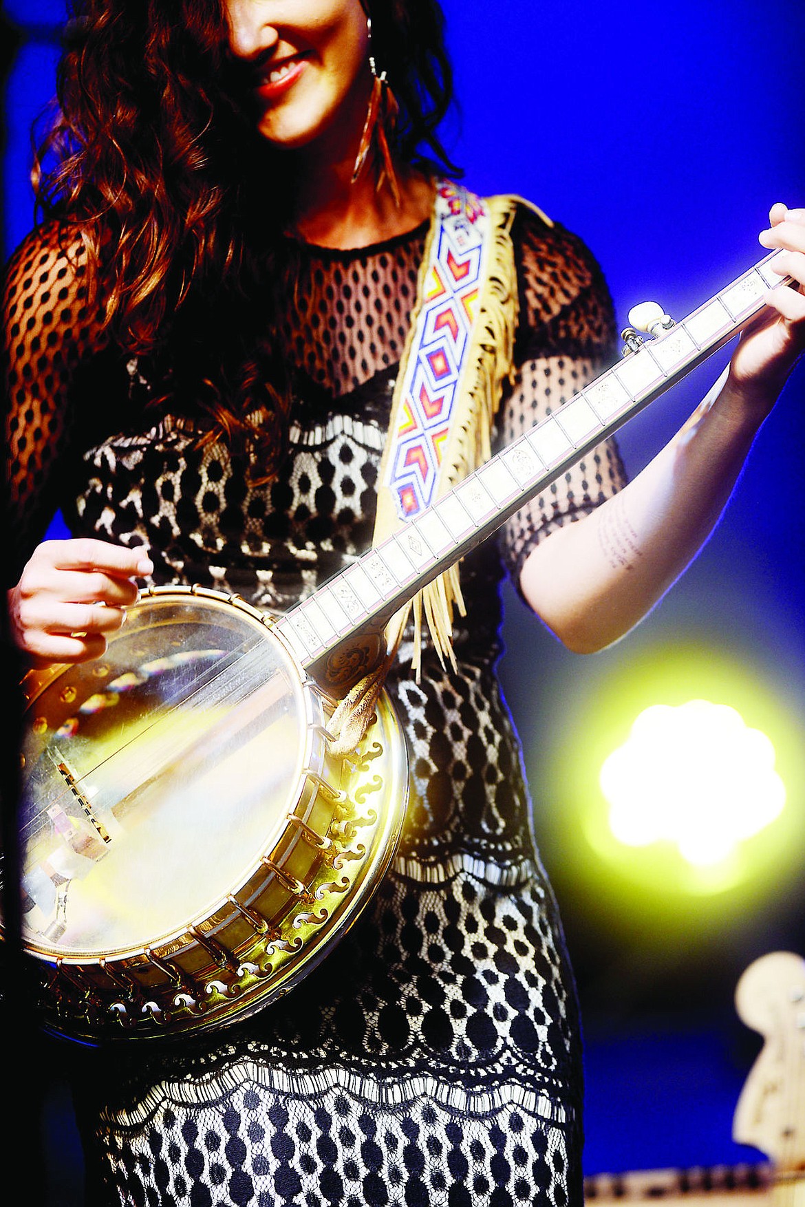 <p>Halladay Quist playing banjo at the Crown of the Continent Guitar Festival on Aug. 24, in Bigfork.</p>