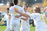 Soccer: 8-0 romp puts Dogs in title game