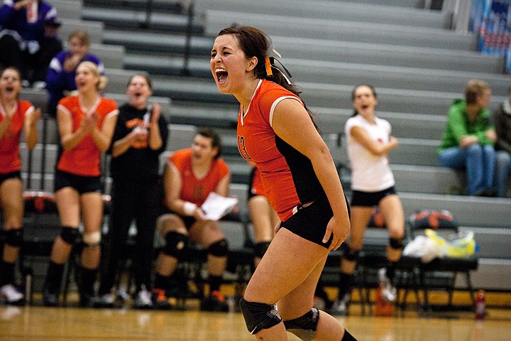 &lt;p&gt;Post Falls' Jasmin Chavez celebrates following a first set point against Lake City High during Saturday's 5A Region 1 Volleyball Championship tournament. Post Falls won the match 3-1.&lt;/p&gt;