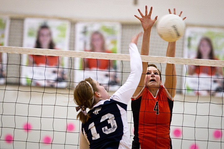 &lt;p&gt;Allison Meehan, of Post Falls, blocks a hit by the Timberwolves' McKinna Seaman in the second set.&lt;/p&gt;