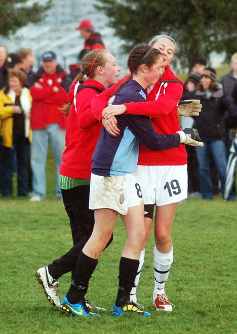 &lt;p&gt;Two Bishop Kelly players collide as Sandpoint seniors Sydney Morris, right, and Melinda Van Dyk, left, fight for possession in the 4A state title game.&lt;/p&gt;