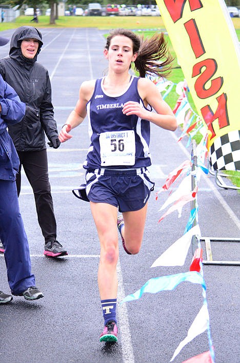 &lt;p&gt;Timberlake's Kassidy Hammond crossed the finish line in 19 minutes, 48 seconds to win the girls race at the 3A District 1 cross country meet on Thursday.&lt;/p&gt;