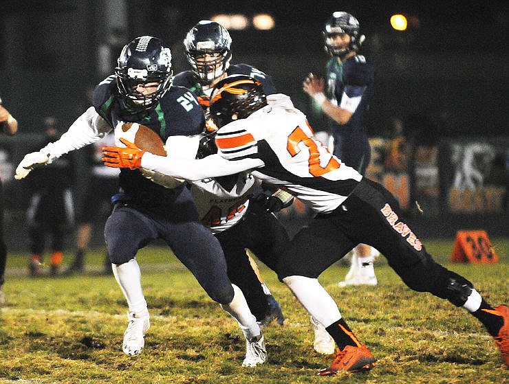 &lt;p&gt;Glacier's Caleb Jones breaks away from Flathead's CJ Dugan during the fourth quarter of the crosstown game. (Aaric Bryan/Daily Inter Lake)&lt;/p&gt;